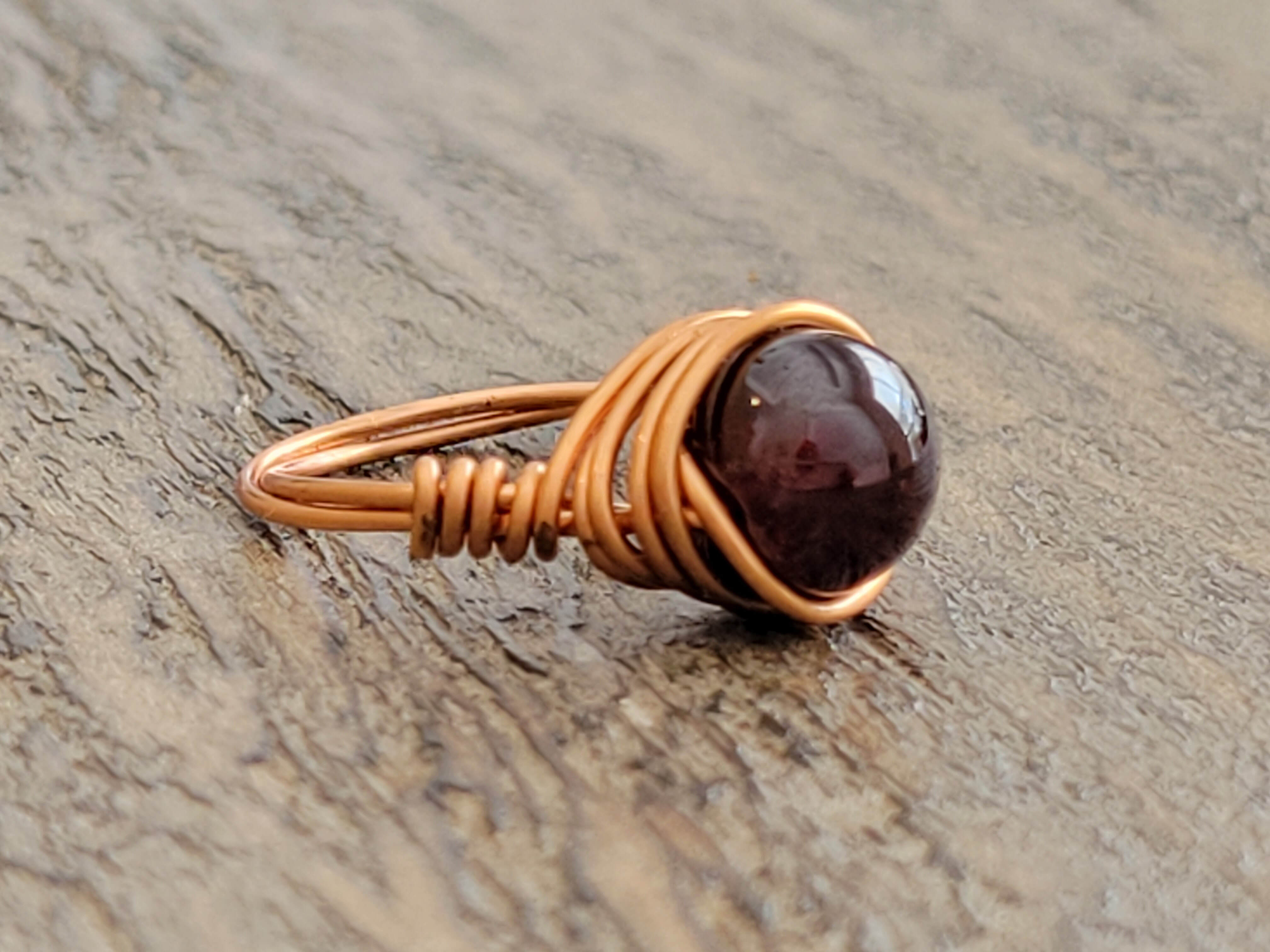 Raw natural Garnet with Cleansing stone set in copper ring Size K NA224